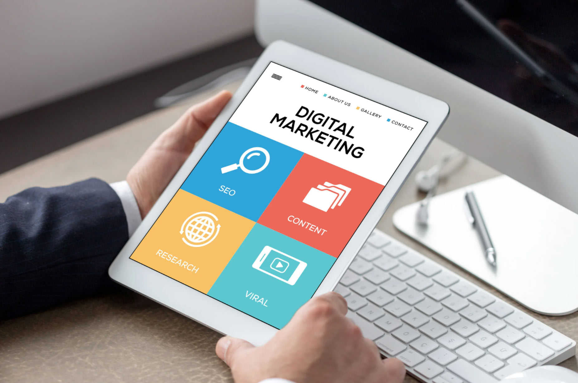 Person holding a tablet displaying a digital marketing dashboard with SEO, Content, Research, and Viral icons.